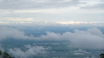 Scenic view of  misty mountain in winter season at  Doi Pha Hee, Chiang Rai, Thailand.