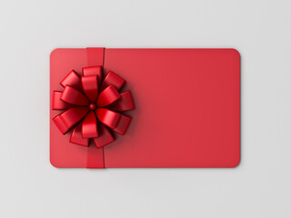 Blank red gift card or gift voucher with red ribbon bow isolated on gray background with shadow minimal conceptual 3D rendering