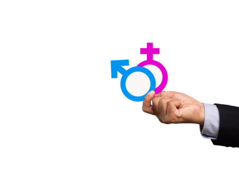 Close-up of hand-holding gender emblems for men and women against a transparent background.