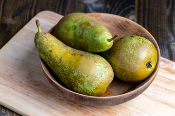 Ripe green pears on the table