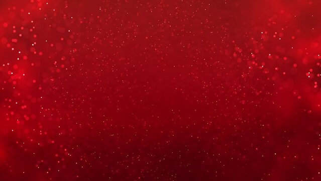Particles abstract background with bokeh on red Background. Futuristic glittering in space.