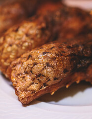 Fried grilled carp, roasted carp fish on plate with lemon and salad served in a traditional restaurant in Montenegro, Skadar lake, prepared cooked crucian carp steak, balkan dish, Montenegrin cuisine