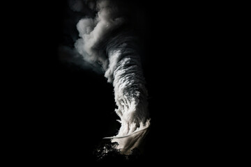 Large powerful Tornado whirlwind. Concept of storms, weather and destruction. Isolated on black for black matte overlay or chromakey background.