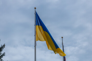 The flag of Ukraine is a big national symbol. Independence Constitution Day, National holiday. Close-up with the flag of Ukraine.