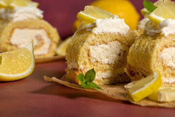 Lemon roll with fruit curd, with mint, close-up