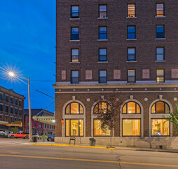 Illuminated evening windows in historic downtown Butte, Montana, USA