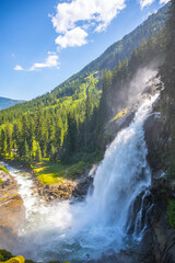 Krimml Waterfalls on sunny summer day. High Tauern National Park, Austrian Alps, Austria