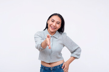 A friendly and chummy young asian woman offers a handshake. A lady giving her congratulations....