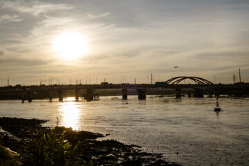 Fototapeta premium Sunset silhouettes on Binh Trieu bridge in Ho Chi Minh City