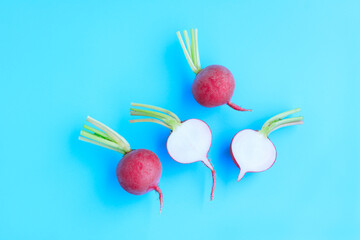 Fresh radish and sliced on blue background, Organic vegetable