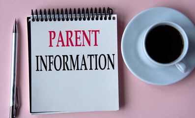 PARENT INFORMATION - words in a white notebook on the background of a cup of coffee, a pen