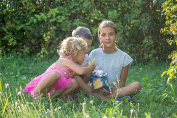 happy children eat chips. Selective focus.