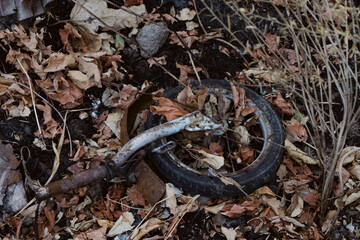 a broken cycle in a landfill garden