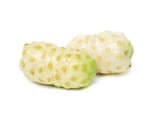 Fresh noni laying on white background.