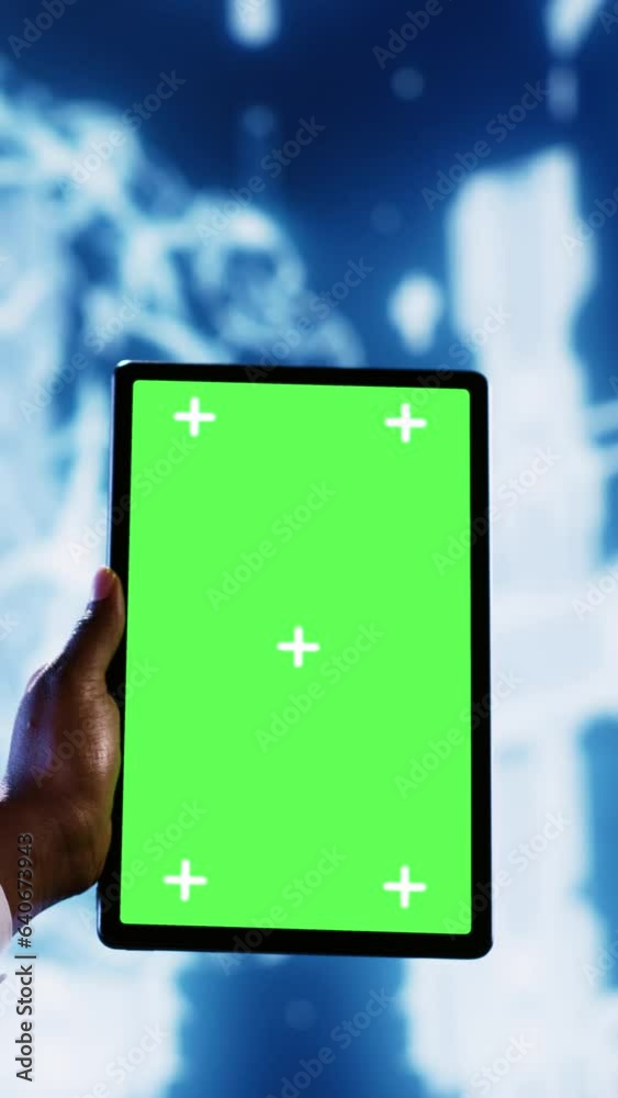 Poster vertical video admin in data center with green screen tablet using artificial intelligence computing