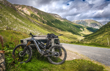 Mountain biking trip. Ebike MTB trip. Alps mountains. - 640675972