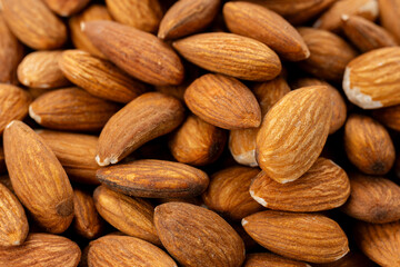 Almond nuts close up. Nut almond close up. Product rich in minerals and vitamins. Almond kernels. Texture of Almond kernels.