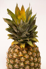 Pineapple isolated on white. Top view.