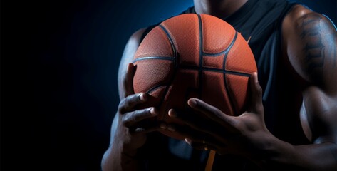 Basketball athlete in a forward stance, holding ball, offering copy