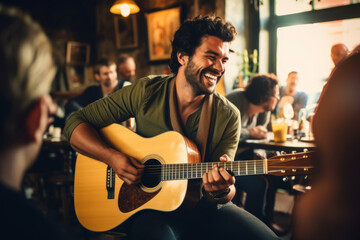 Cheerful musician performing in a pub. Performer playing a guitar. People gathering in the background.