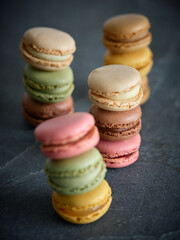 Set of various macaroons on table