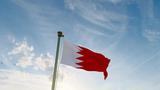 Flag of bahrain waving in the wind, sky and sun background video. Bahrain flag video.  4K UHD. 
