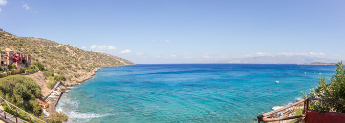 Panoramic view of the turquoise mediterranean sea at the island of Crete, Greece, near Agios Nikolaos