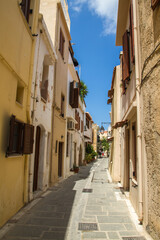 Fototapeta na wymiar Street with historical buildings at old town centre of Rethymno, Crete, Greece