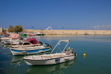 Harbor with boats and Mediterranean Sea at Rethymno, Crete, Greece