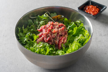 Korean food dish Beef tartare, beef sashimi, meat pancake, beef tartare bibimbap, Korean beef