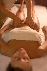 Obraz na płótnie Canvas Masseuse hands massaging female client abdomen in spa salon