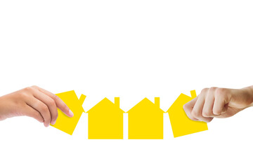 Fototapeta na wymiar Digital png illustration of hands with yellow houses on transparent background