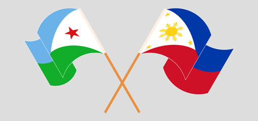 Crossed and waving flags of Djibouti and the Philippines