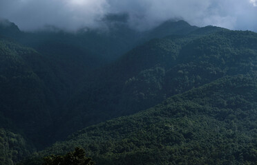 Naklejka premium clouds over the mountains