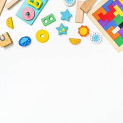 Kids toys on white background. Top view. Flat lay. Copy space for text