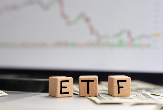 ETF or Exchange Traded Fund text on black block
