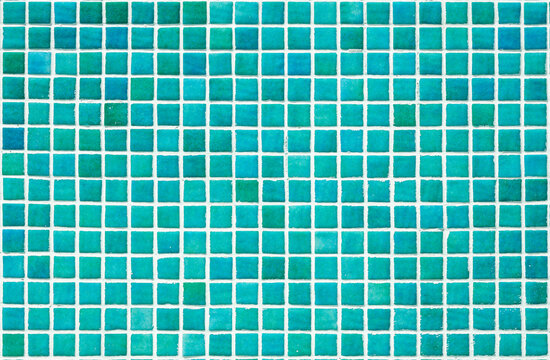 Texture of a wall covered with decorative brick-like tiles mosaic. Abstract background for design.