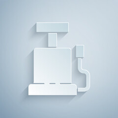 Paper cut Car air pump icon isolated on grey background. Paper art style. Vector