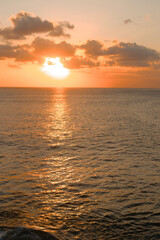 Beautiful view of the warm sunset and the Indian Ocean