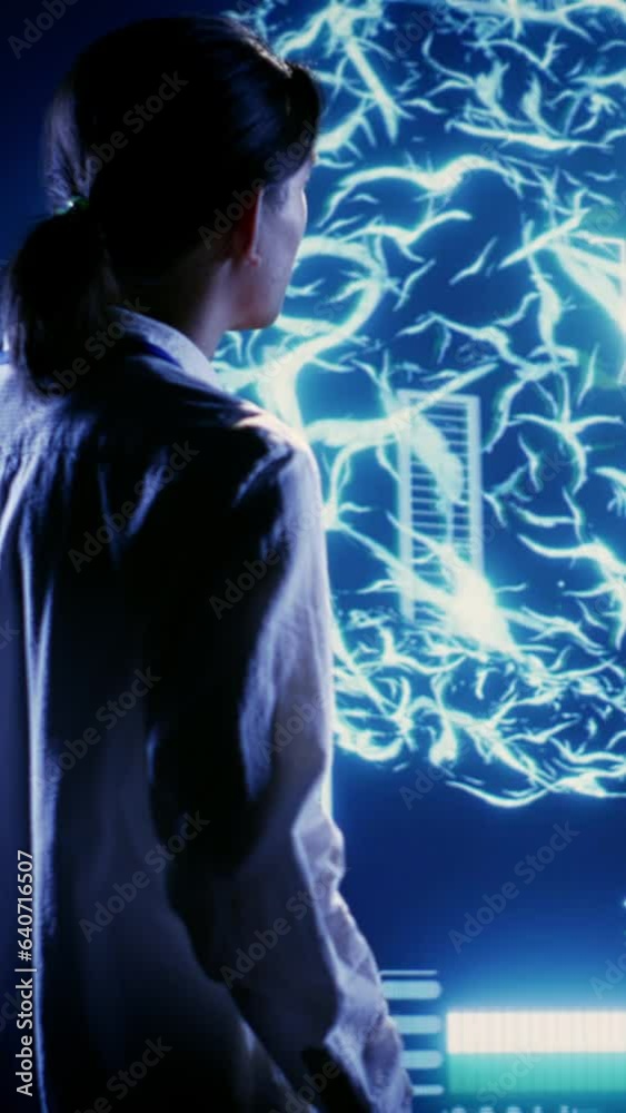 Poster vertical video dilligent bipoc workers looking at hologram of artificial intelligence human brain si