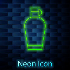 Glowing neon line Canteen water bottle icon isolated on brick wall background. Tourist flask icon. Jar of water use in the campaign. Vector