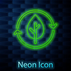 Glowing neon line Recycle symbol and leaf icon isolated on brick wall background. Environment recyclable go green. Vector