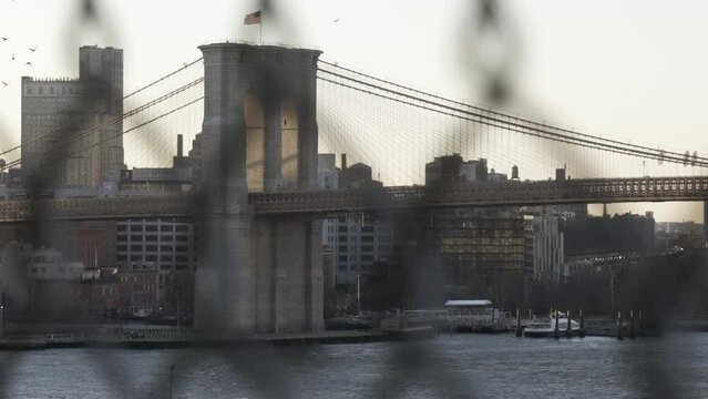 Brooklyn Bridge in New York filmed through fence
