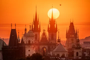 Washable wall murals Prague A rising sun behind towers of the Church of Our Lady before Tyn in Prague.