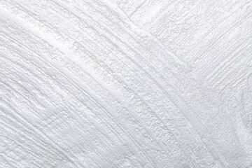 Light gray pearlescent plaster stone wall texture background