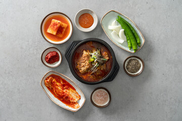 Korean food dish Side dishes, pork rib hangover soup, gopchang hot pot, and gamjatang