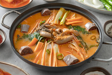 Korean food dish Side dishes, pork rib hangover soup, gopchang hot pot, and gamjatang