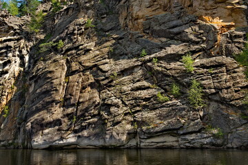 Russia. Chita region. Coastal rocks on the Burkal River, whose fast waters tend to the Selenga...