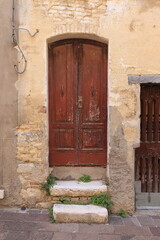 Old Wooden Door with Stone Steps in Calvi dell'Umbria, Italy
