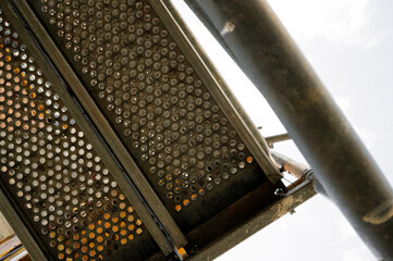 Scaffolding close up. Pattern of metal elemets. facade renovation. 